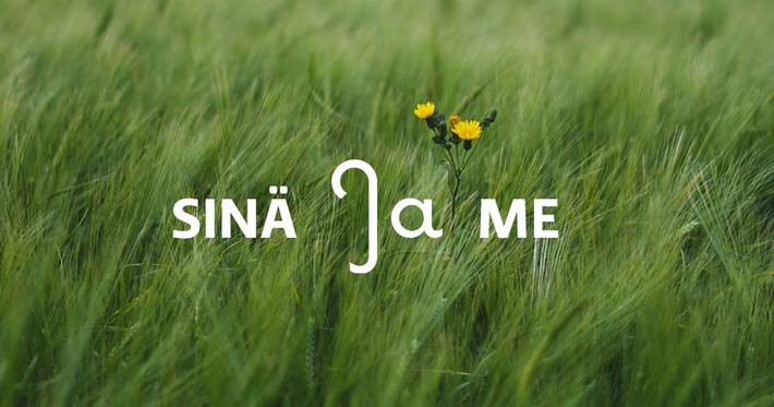 Kuvassa niitty ja siinä sanat sinä ja me. Kuvassa niitty ja siinä sanat sinä ja me.